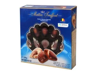 Конфеты GUNZ Maitre Truffout "Морские ракушки" с ореховой начинкой, синяя с окном /картон/ 250г*12